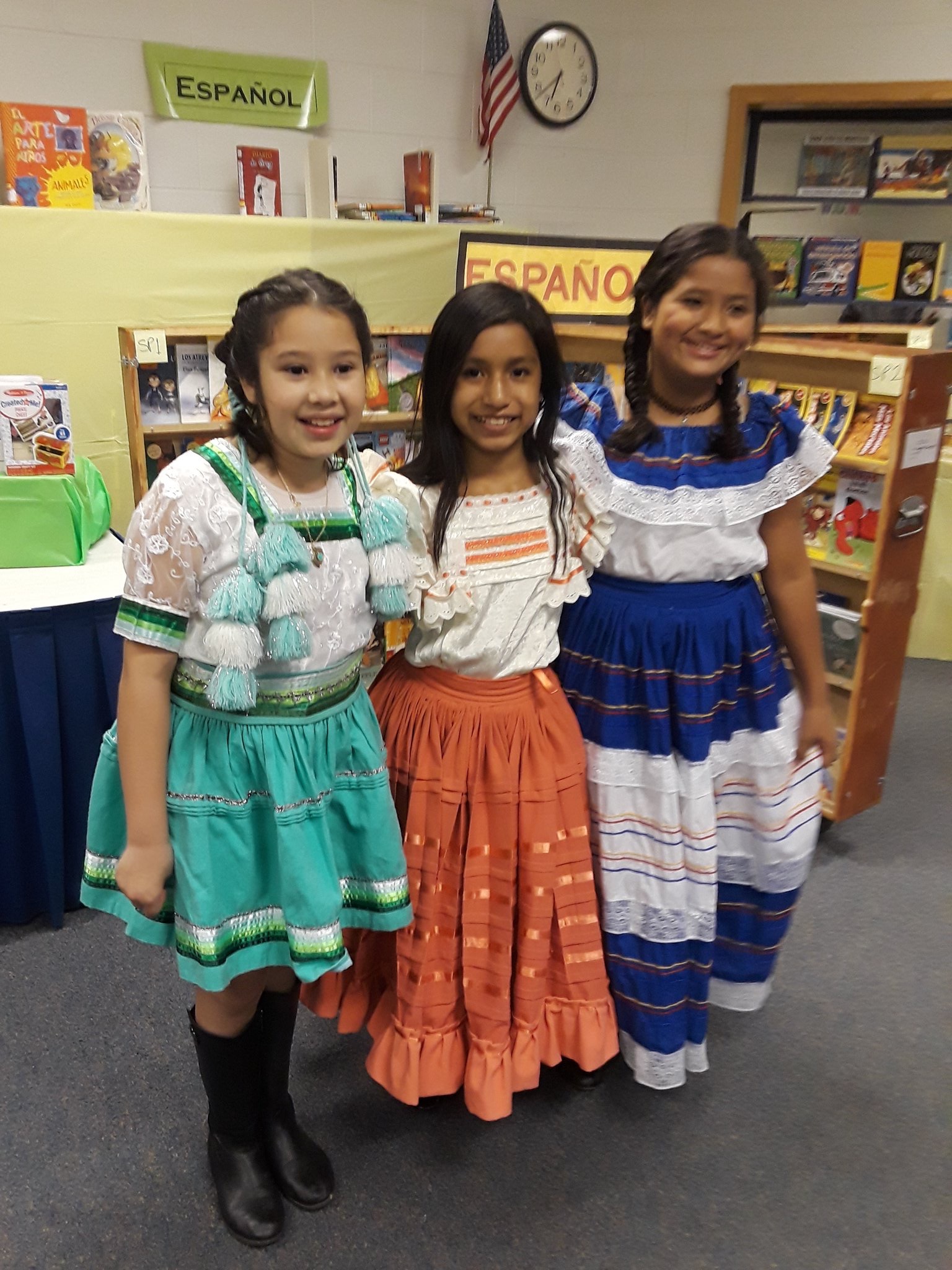 students showing traditional dress from Hispanic culture