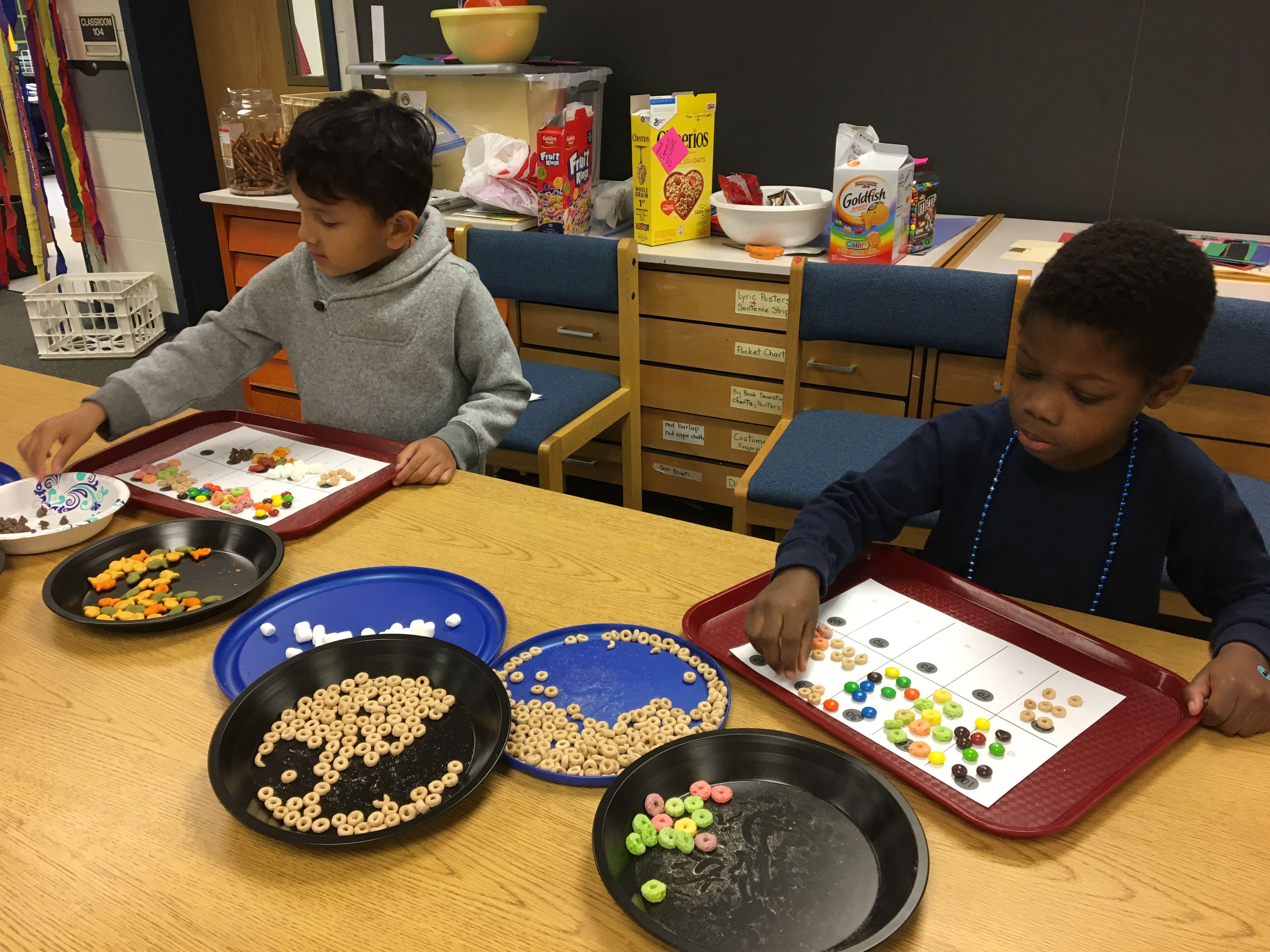 pictures of students sorting snacks